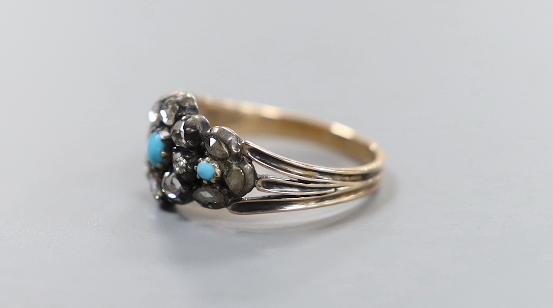 A Georgian yellow metal, diamond and turquoise set cluster ring, with turquoise and diamond set split shoulders (stoen missing), size P, gross weight 3.1 grams.